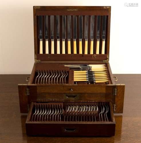 An oak canteen of silver plated flatware for twelve place settings,