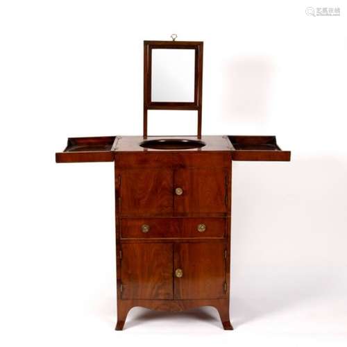 A Regency mahogany enclosed washstand with cupboards and drawers beneath, on splay feet,