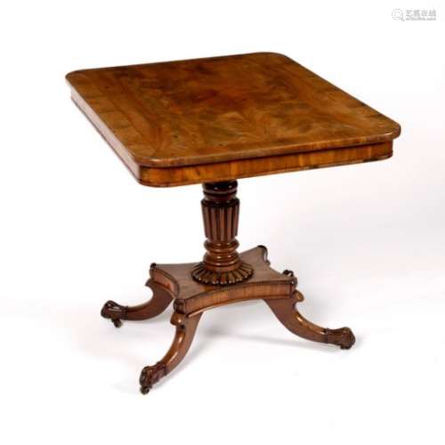 A Regency rosewood table with plain frieze on reeded taper column and four splay feet,