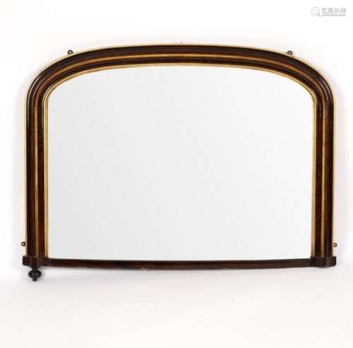 A Victorian parcel gilt overmantel mirror, with arch-top,