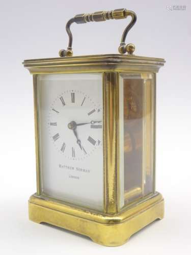 20th century Matthew Norman brass and bevel glazed carriage clock, white enamel Roman dial,