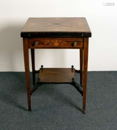 An Edwardian rosewood envelope card table, on square taper legs,