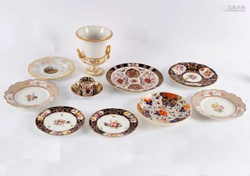 A collection of eight English porcelain plates, a Derby coffee can,