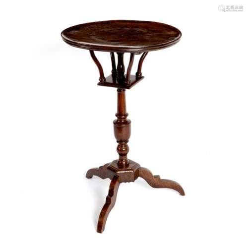 An 18th Century Scandinavian elm table, on turned column and tripod support,