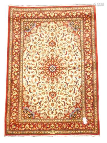 Persian fine tabriz red ground rug, central medallion on ivory field, interlaced foliate,