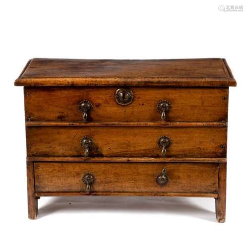 An 18th Century Welsh fruitwood chest, with false two drawer and single drawer front, 58.