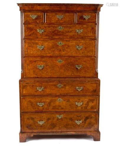 A George II walnut chest on chest, fitted six long and three short drawers, on bracket feet,