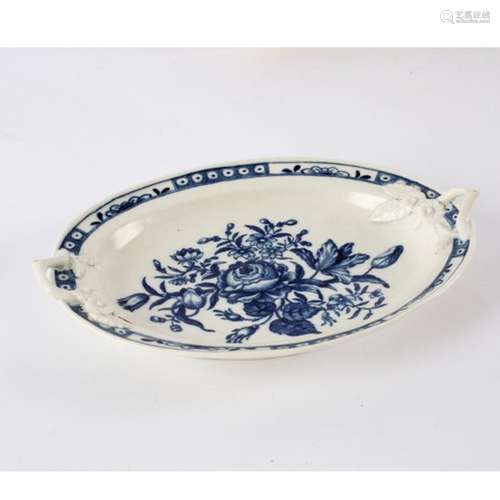 An 18th Century Worcester blue and white oval stand, rose pattern, crescent mark,