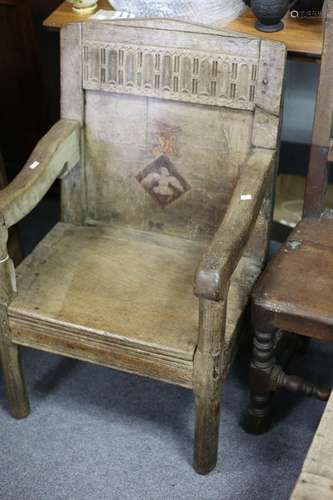 A 17th Century oak armchair,