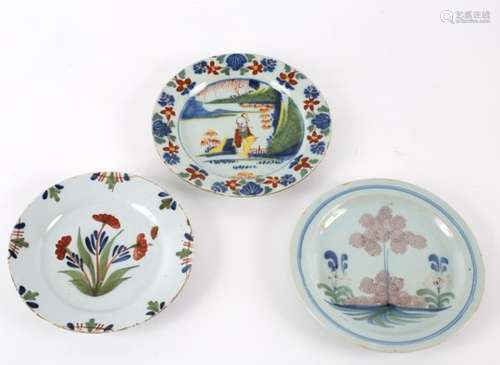 Three English Delft plates, first half of the 18th Century,