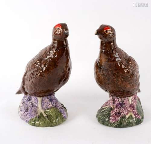 A pair of Beswick Royal Doulton whisky decanters modelled as grouse, for Matthew Gloag & Son Ltd.