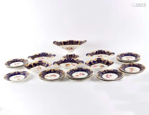 Sixteen early 19th Century dessert plates, five serving dishes and a stemmed fruit bowl,