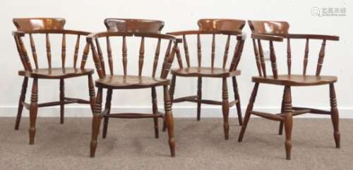 Set four 20th century elm and beech smokers bow armchairs, tub shaped spindle backs,
