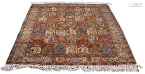 A Kayseri silk rug with field of mihrab niches and fighting stag border, 20th Century,