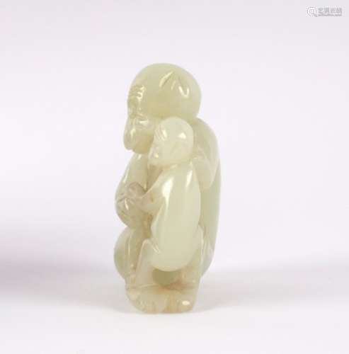 A Chinese pale celadon jade carving of a monkey with young, 18th/19th Century, 4.