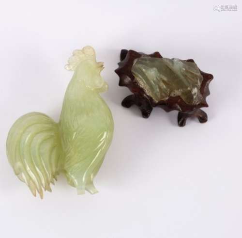 A modern jadeite figure of a cockerel on a hardwood base,