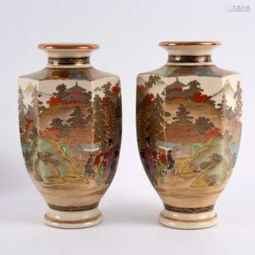 A pair of Japanese Satsuma hexagonal vases, painted with figures in a river landscape, signed,