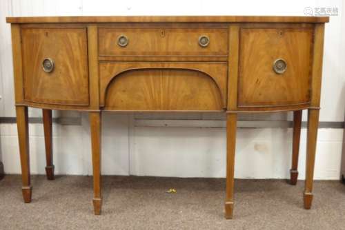 Edwardian mahogany break bow front sideboard, cross banded top above two drawers,