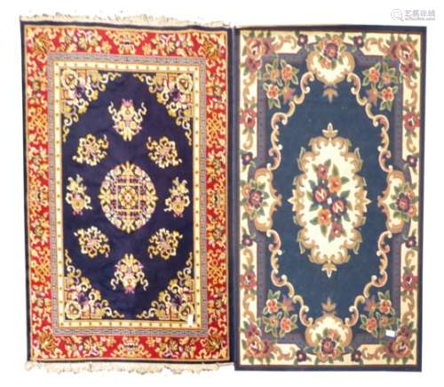 20th century Persian design ground rug, floral medallion on blue field,