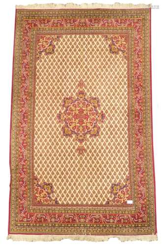 Central Asian design finely knotted red ground rug, floral medallion,