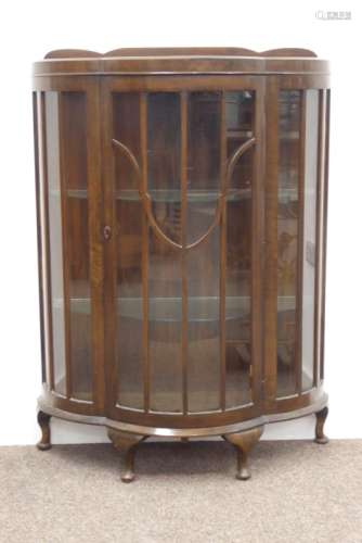 20th century dark oak bow front display cabinet, central glazed door enclosing 2 shelves,