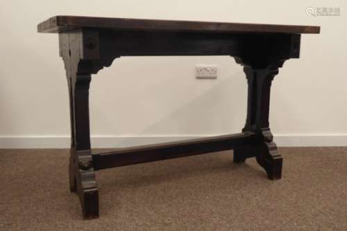 Arts & Crafts oak refectory style table, plank top shaped supports joined by chamfered stretcher,