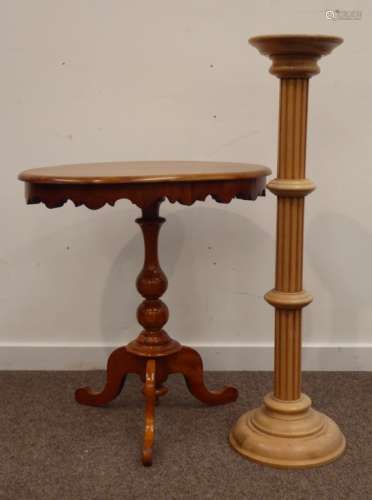 Late 19th century Satin walnut tripod occasional table, the oval top above shaped apron,