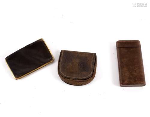 A leather cigar case,