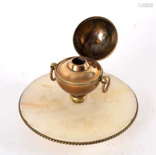 An unusual inkwell of spherical form with ring handles to the sides,
