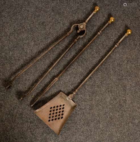 A set of early 19th Century burnished steel fire irons with brass knops (3)/Provenance: Phillips 09.