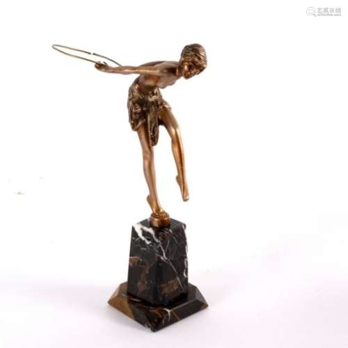After Demetre Chiparus/Young Girl with Hoop/an Art Deco style figure with bronze colour finish on a
