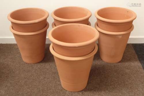 Set eight stackable terracotta tapering plant pots,