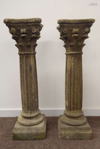 Pair weathered composite stone Corinthian columns,