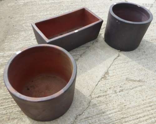 Pair rustic cylindrical terracotta planters, (W54cm, H44cm) and a matching trough (81cm x 41xm,