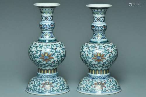 A PAIR OF DOUCAI VASES QIANLONG MARK AND PERIOD