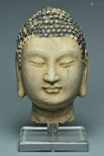 A LIMESTONE HEAD OF BUDDHA AND STAND