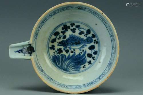A YUAN DYNASTY BLUE AND WHITE POURING BOWL