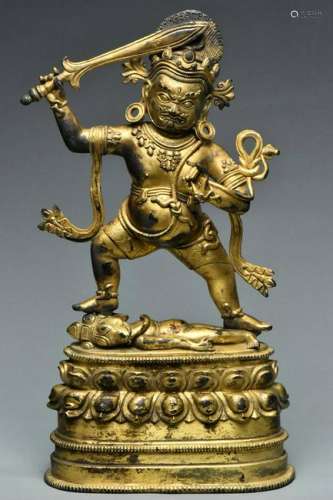 A EARLY MING DYNASTY GILT BRONZE MAHAKALA