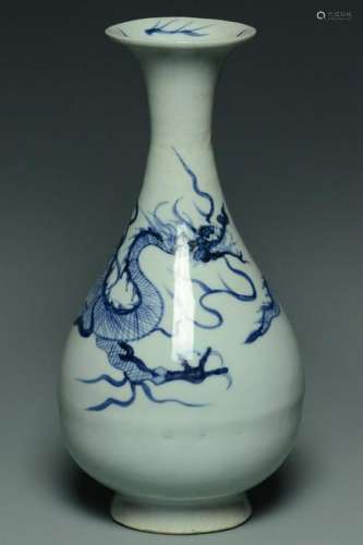 A YUAN DYNASTY BLUE AND WHITE DRAGON VASE