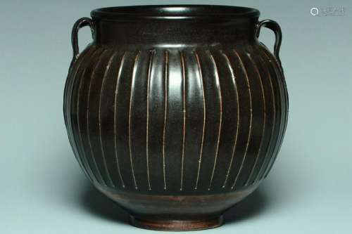 A SONG DYNASTY HENAN BLACK GLAZED RIBBED JAR