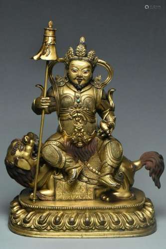 A MING DYNASTY GILT BRONZE FIGURE OF WEITUO