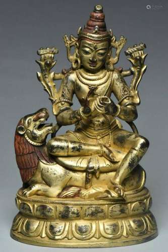 A QING DYNASTY GILT BRONZE AVALOKITESHVARA