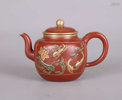 A CHINESE GILT DECORATED ZISHA TEAPOT, INSCRIBED