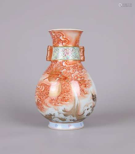 A CHINESE GILT-DECORATED IRON-RED VASE