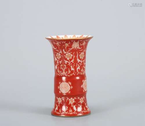 A CHINESE GILT-DECORATED IRON-RED GU-FORM VASE