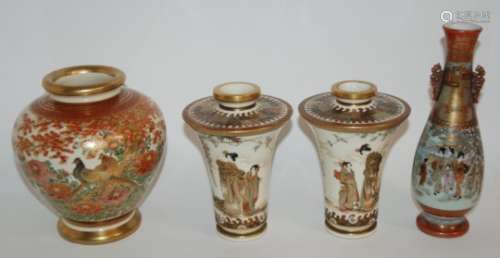 A PAIR OF SATSUMA CYLINDRICAL VASES painted with figures beneath wisteria and gilt trellis, the