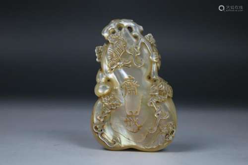A CHINESE MOTHER-OF-PEARL PENDANT, QING DYNASTY