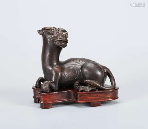 A CHINESE BRONZE MYTHICAL BEAST, QING DYNASTY