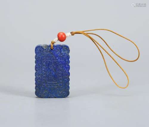 A CHINESE CARVED LAPIS PENDANT