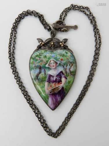 AN ARTS & CRAFTS PENDANT with a finely painted enamel plaque of a maiden picking apples, in white